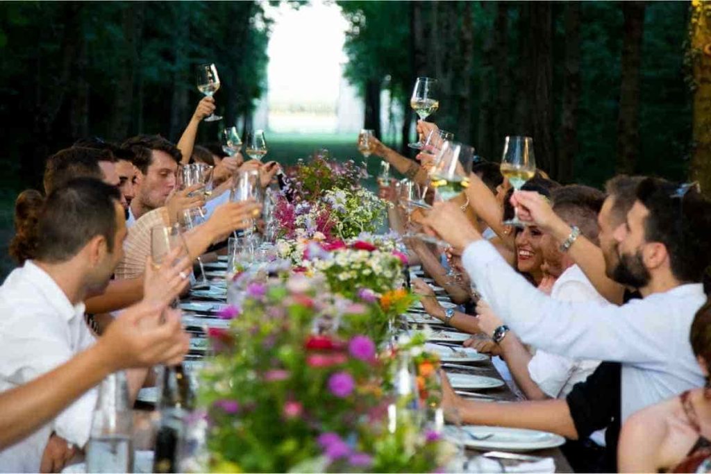 Everyone raises a toast at dinner table